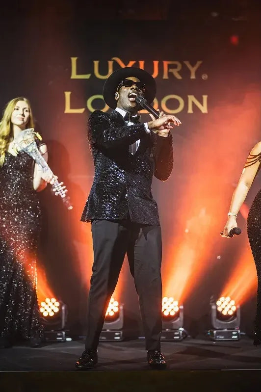 Live singer and band performing on stage at the London New Year's Eve Masquerade